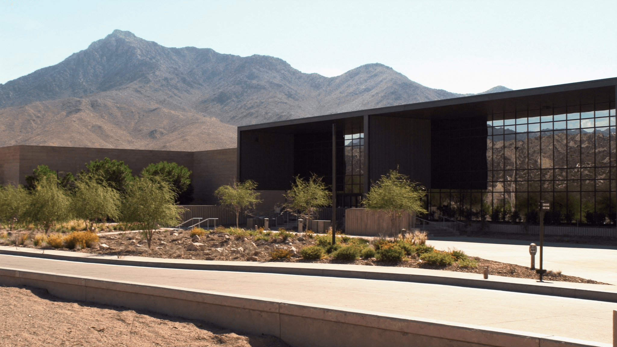 Modern commercial building against the Franklin Mountains in El Paso, Texas